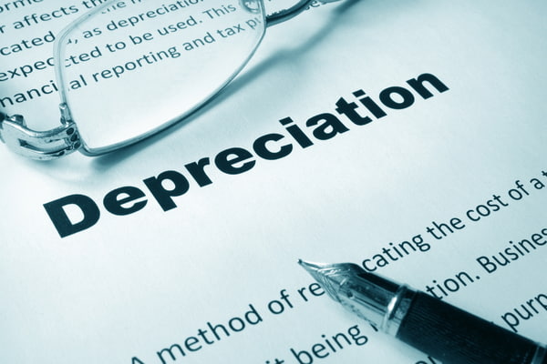 Paper with sign Depreciation and a pen